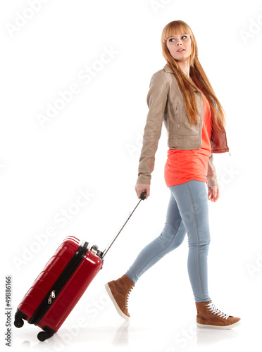 Photo: young girl with suitcase on white young girl with suitcase on white
