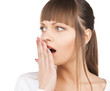 woman with hand over mouth