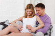 Happy pregnant family