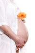 Pregnant woman with flower