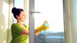 Women cleaning a window