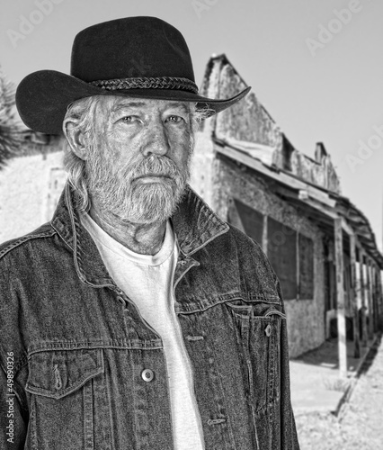 Photo: Cowboy in an old western town Cowboy in an old western town