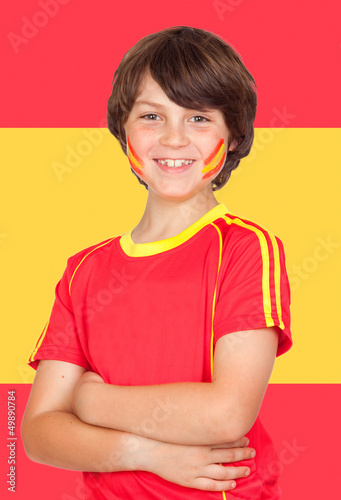 Photo: Spanish boy with t-shirt team and Spain flag Spanish boy with t-shirt team and Spain flag