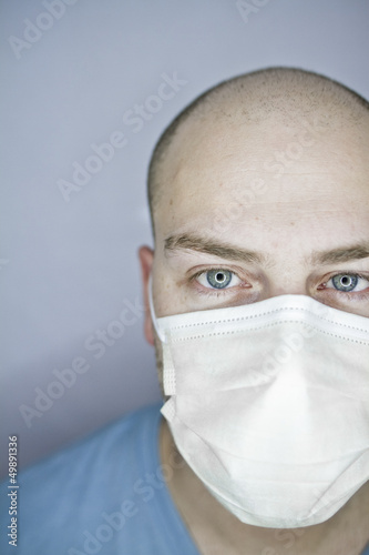 Photo: Half face with white mask Half face with white mask