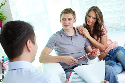 Photo: Discussing insurance program Discussing insurance program