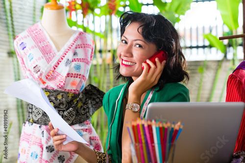 Photo: Fashion designer working at home Fashion designer working at home