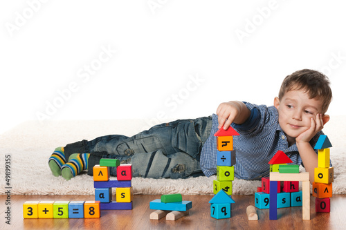 Photo: Playing on the carpet little boy Playing on the carpet little boy