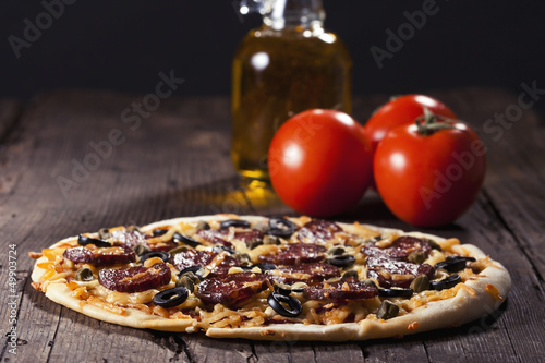 Photo: Tasty salami pizza Tasty salami pizza