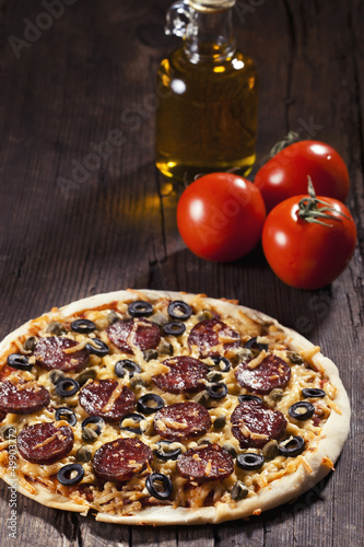 Photo: Tasty salami pizza Tasty salami pizza