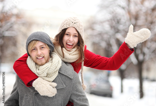 Photo: Couple playing in snow Couple playing in snow
