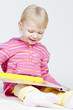 Foto: little girl with a book little girl with a book