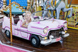 Photo: little girl on carousel little girl on carousel
