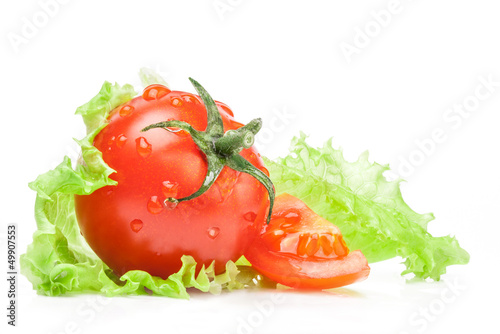 Photo: Tomato and lettuce isolated on white background Tomato and lettuce isolated on white background