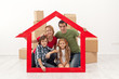 Happy family in their new home