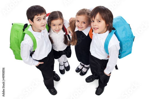 Photo: Happy school kids with back packs Happy school kids with back packs