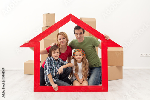 Photo: Happy family in their new home Happy family in their new home