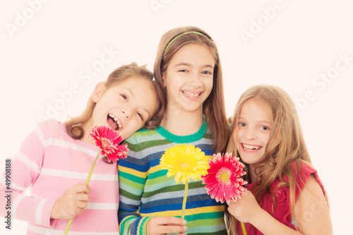 Photo: happy children with flowers happy children with flowers