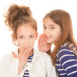 children whispering secrets