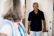 Mature couple entering room