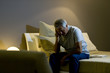 Mature man in bed