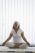 Mature woman doing yoga