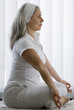 Mature woman doing yoga