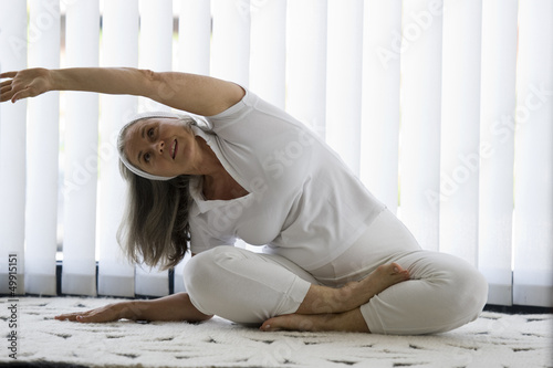 Photo: Mature woman doing yoga Mature woman doing yoga