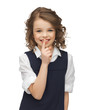 pre-teen girl showing hush gesture