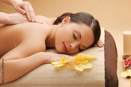 Photo: beautiful woman in massage salon beautiful woman in massage salon