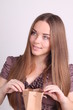 Beautiful long-haired girl with shopping bags