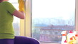 Women cleaning a window