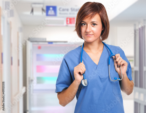 Photo: Nurse in a hospital hallway Nurse in a hospital hallway