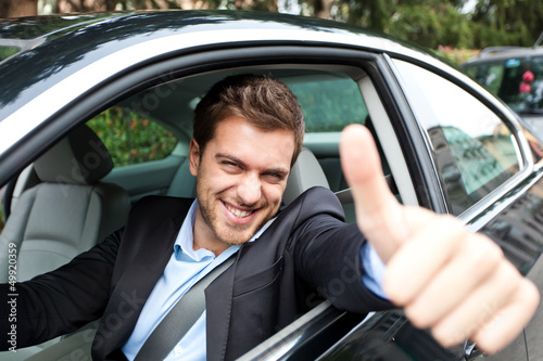 Photo: Car driver making ok sign Car driver making ok sign