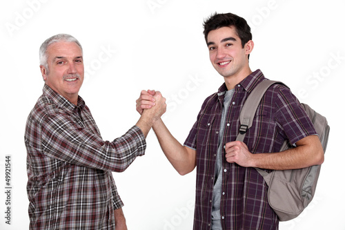 Photo: Experienced handyman greeting new starter Experienced handyman greeting new starter