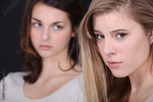 Photo: Two young women post-argument Two young women post-argument