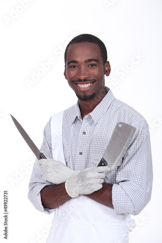 Photo: Butcher holding knives Butcher holding knives