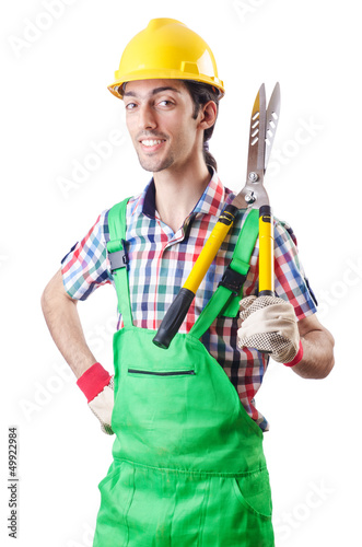 Photo: Man gardener with shears on white Man gardener with shears on white