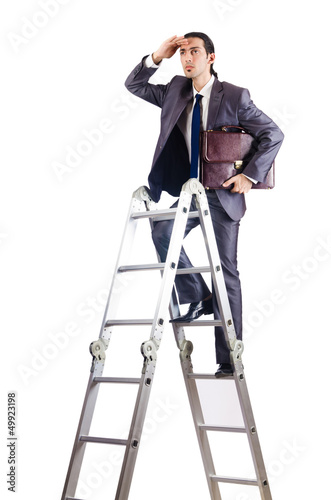 Photo: Businessman climbing career ladder on white Businessman climbing career ladder on white