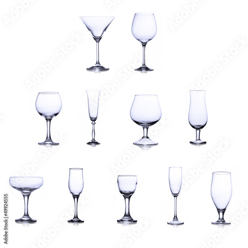 Photo: collection of empty glasses isolated on white background collection of empty glasses isolated on white background