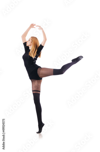 Photo: Young woman dancing on white background Young woman dancing on white background