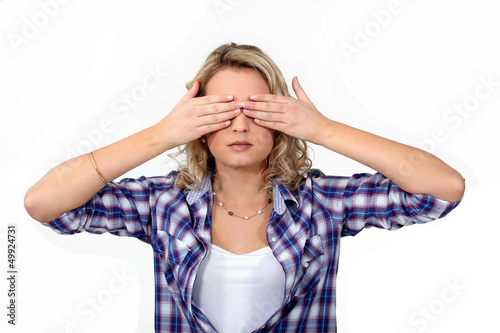 Photo: Woman covering her eyes Woman covering her eyes