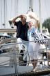 Mature couple enjoying a stroll at a marina