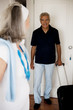 Mature couple entering room