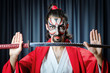 Man with sword and face mask