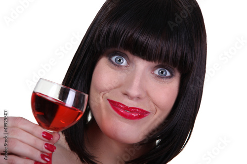 Photo: Happy brunette likes wine Happy brunette likes wine