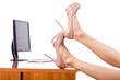 Woman legs on the desk