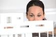 Woman observing architect plan