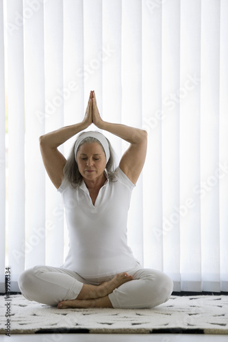 Photo: Mature woman doing yoga Mature woman doing yoga