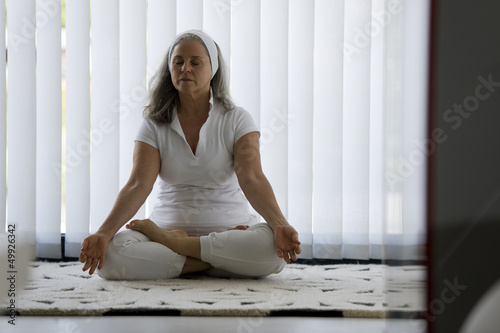 Photo: Mature woman doing yoga Mature woman doing yoga