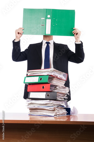 Photo: Young busy businessman at his desk Young busy businessman at his desk